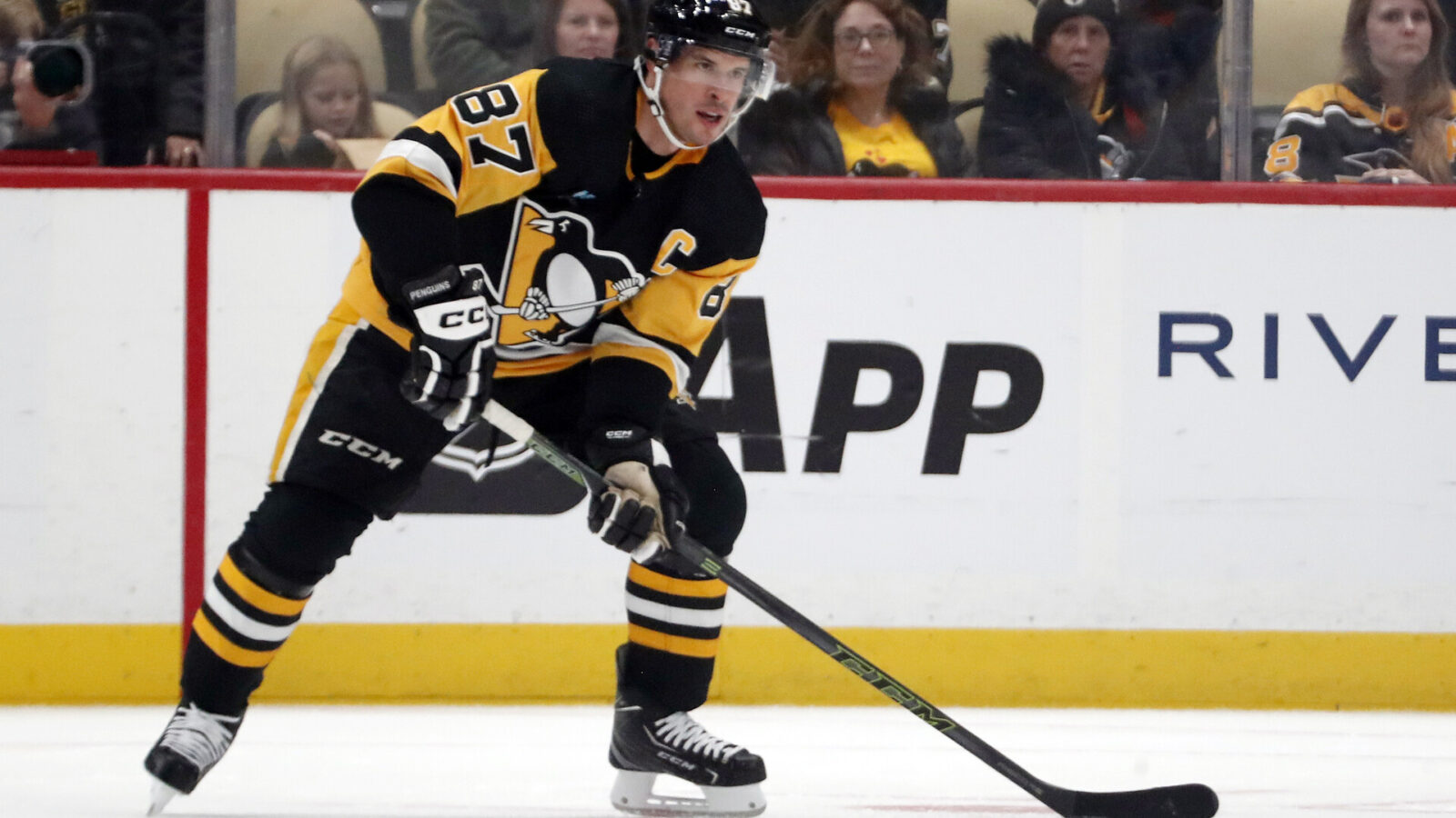 Sep 28, 2023; Pittsburgh, Pennsylvania, USA; Pittsburgh Penguins center Sidney Crosby (87) handles the puck against the Buffalo Sabres during the first period at PPG Paints Arena.