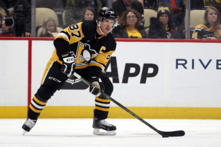Sep 28, 2023; Pittsburgh, Pennsylvania, USA; Pittsburgh Penguins center Sidney Crosby (87) handles the puck against the Buffalo Sabres during the first period at PPG Paints Arena.
