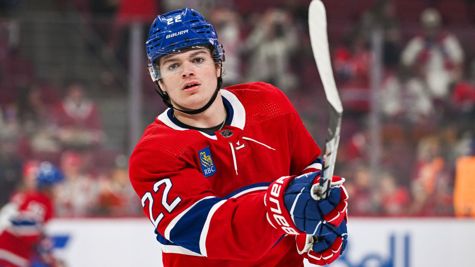 Montreal Canadiens right wing Cole Caufield (22) looks on during warm-up before the game against the Toronto Maple Leafs at Bell Centre.