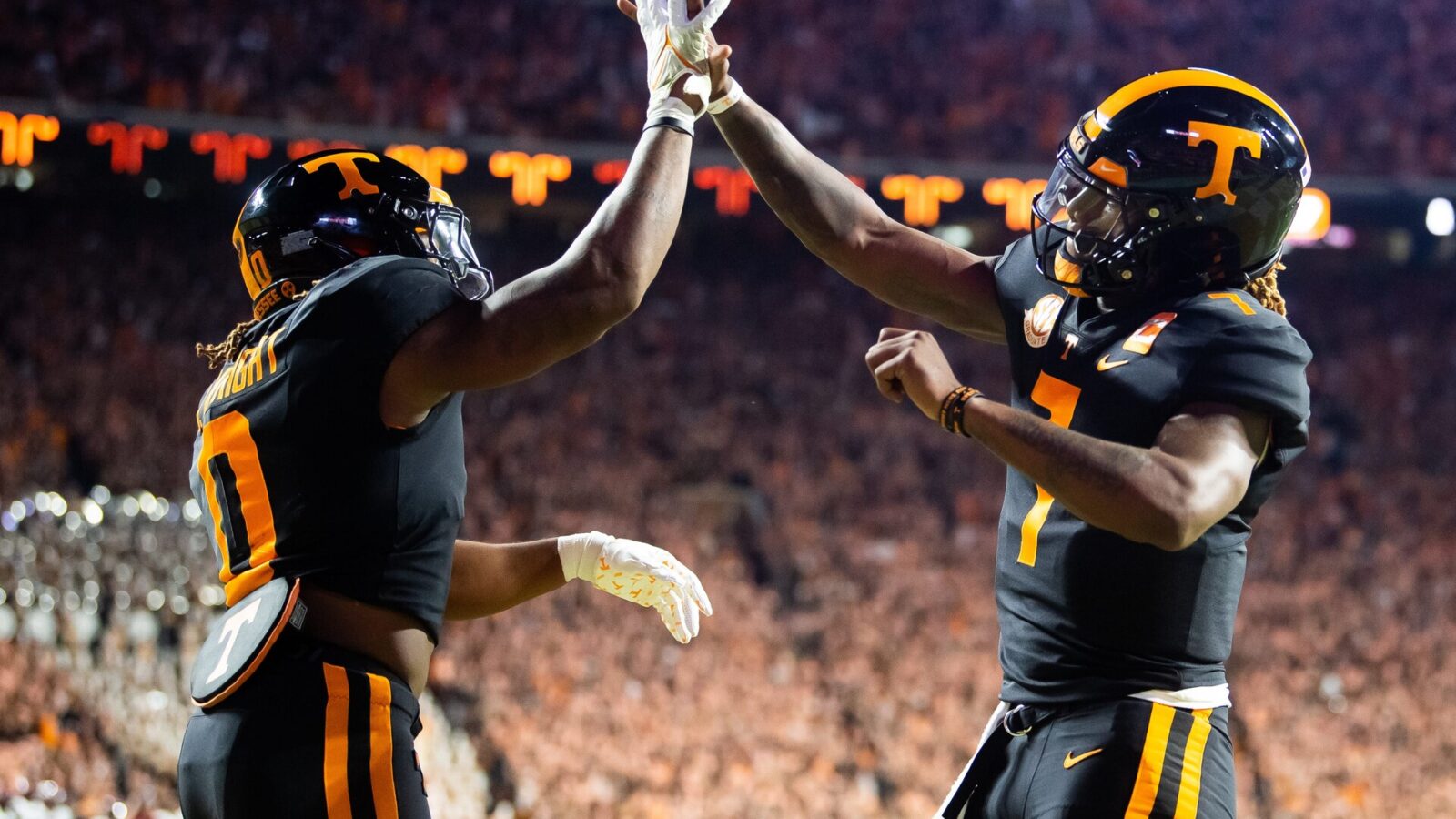 Tennessee quarterback Joe Milton III (7) and Tennessee running back Jaylen Wright (0) celebrate after Wright scored a touchdown during a football game between Tennessee and South Carolina at Neyland Stadium in Knoxville, Tenn., on Saturday, Sept. 30, 2023.