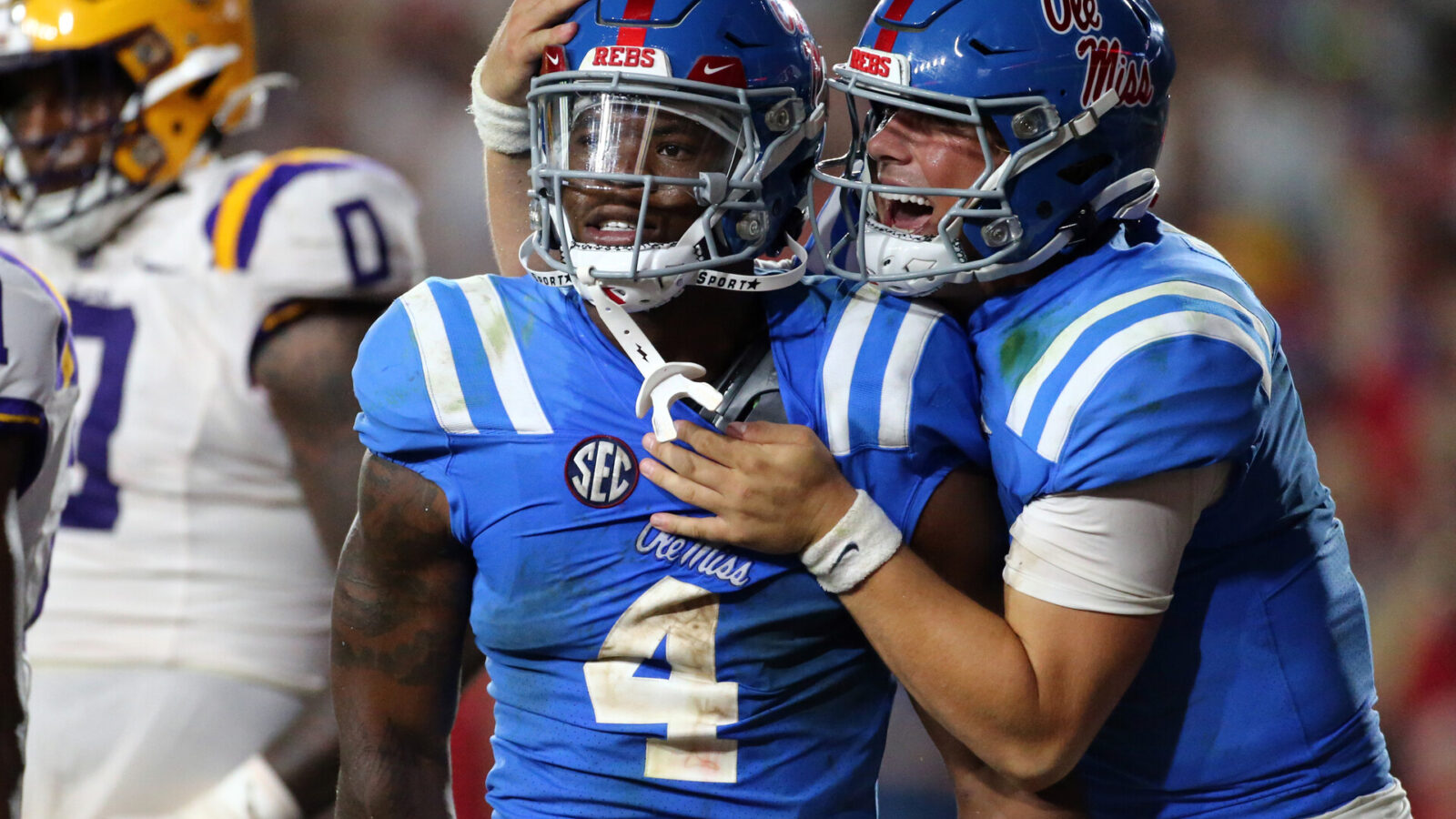 Mississippi Rebels quarterback Jaxson Dart (2) celebrates with running back Quinshon Judkins (4) after a touchdown during the second half against the LSU Tigers at Vaught-Hemingway Stadium.
