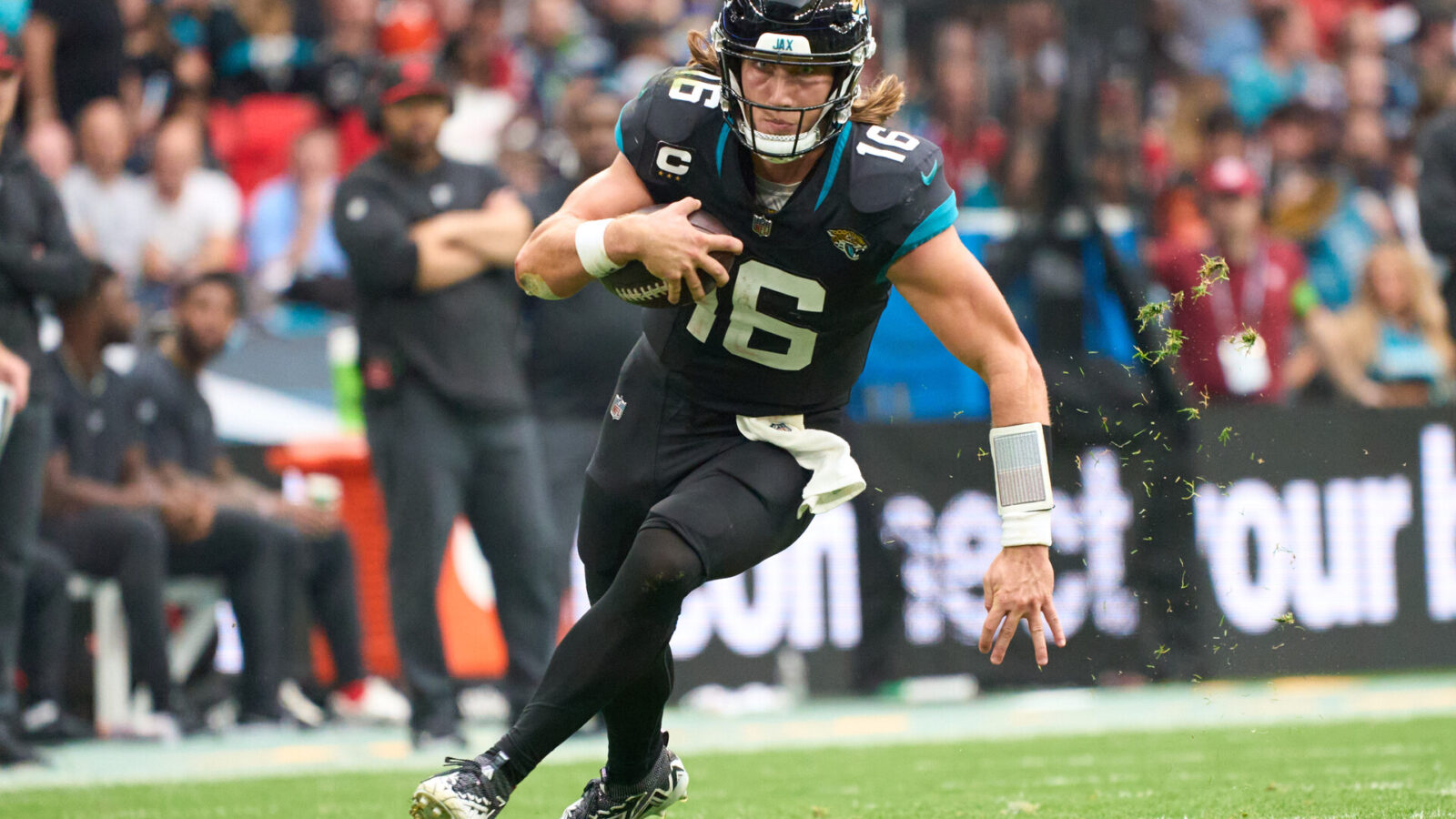 Oct 1, 2023; London, United Kingdom; Jacksonville Jaguars quarterback Trevor Lawrence (16) carries the ball during the second half of an NFL International Series game at Wembley Stadium.