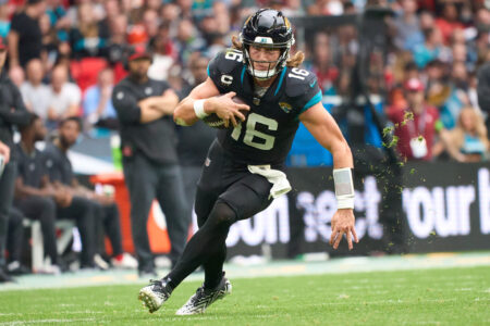 Oct 1, 2023; London, United Kingdom; Jacksonville Jaguars quarterback Trevor Lawrence (16) carries the ball during the second half of an NFL International Series game at Wembley Stadium.