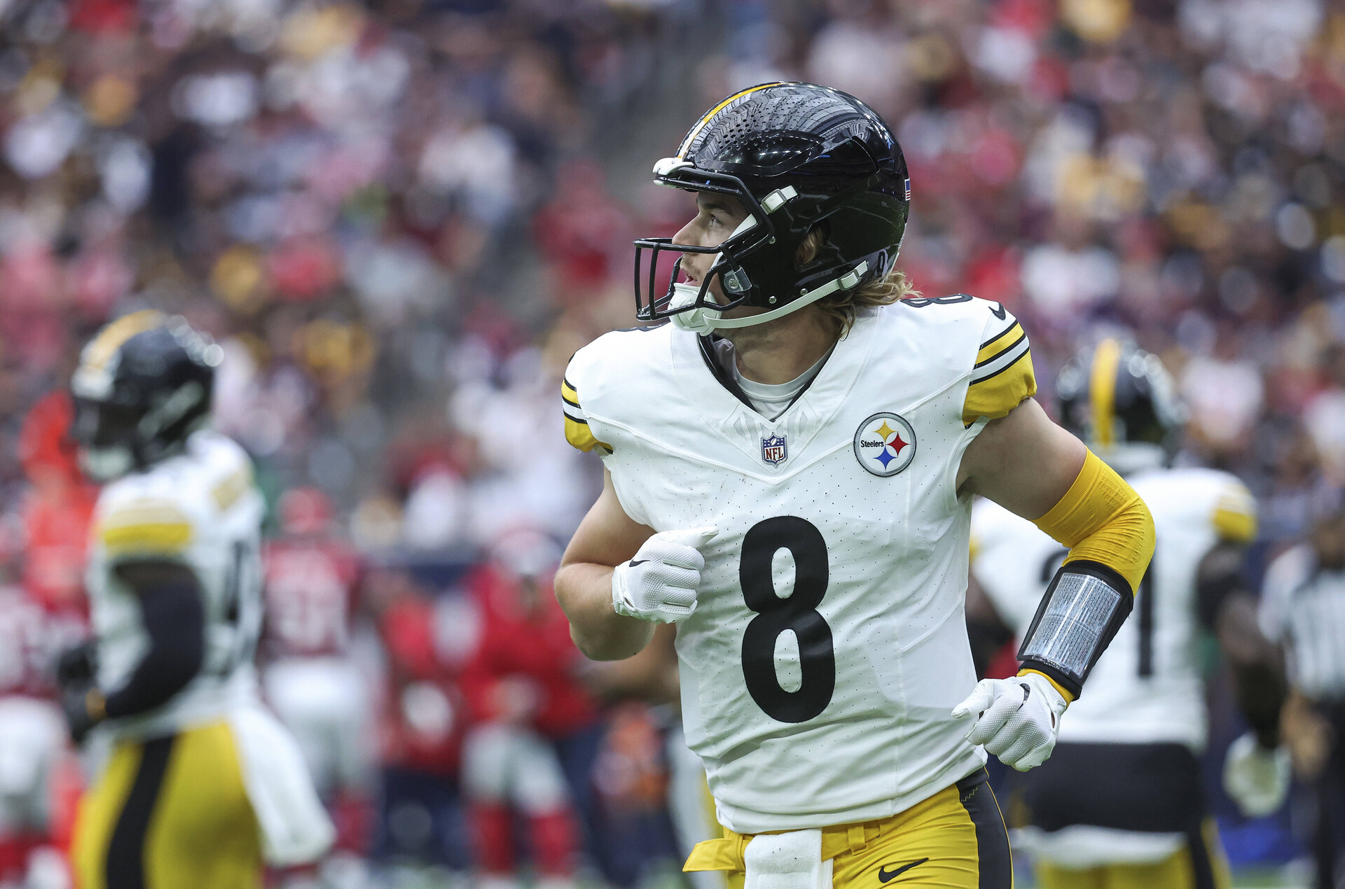 Oct 1, 2023; Houston, Texas, USA; Pittsburgh Steelers quarterback Kenny Pickett (8) jogs off the field after a play during the first quarter against the Houston Texans at NRG Stadium.
