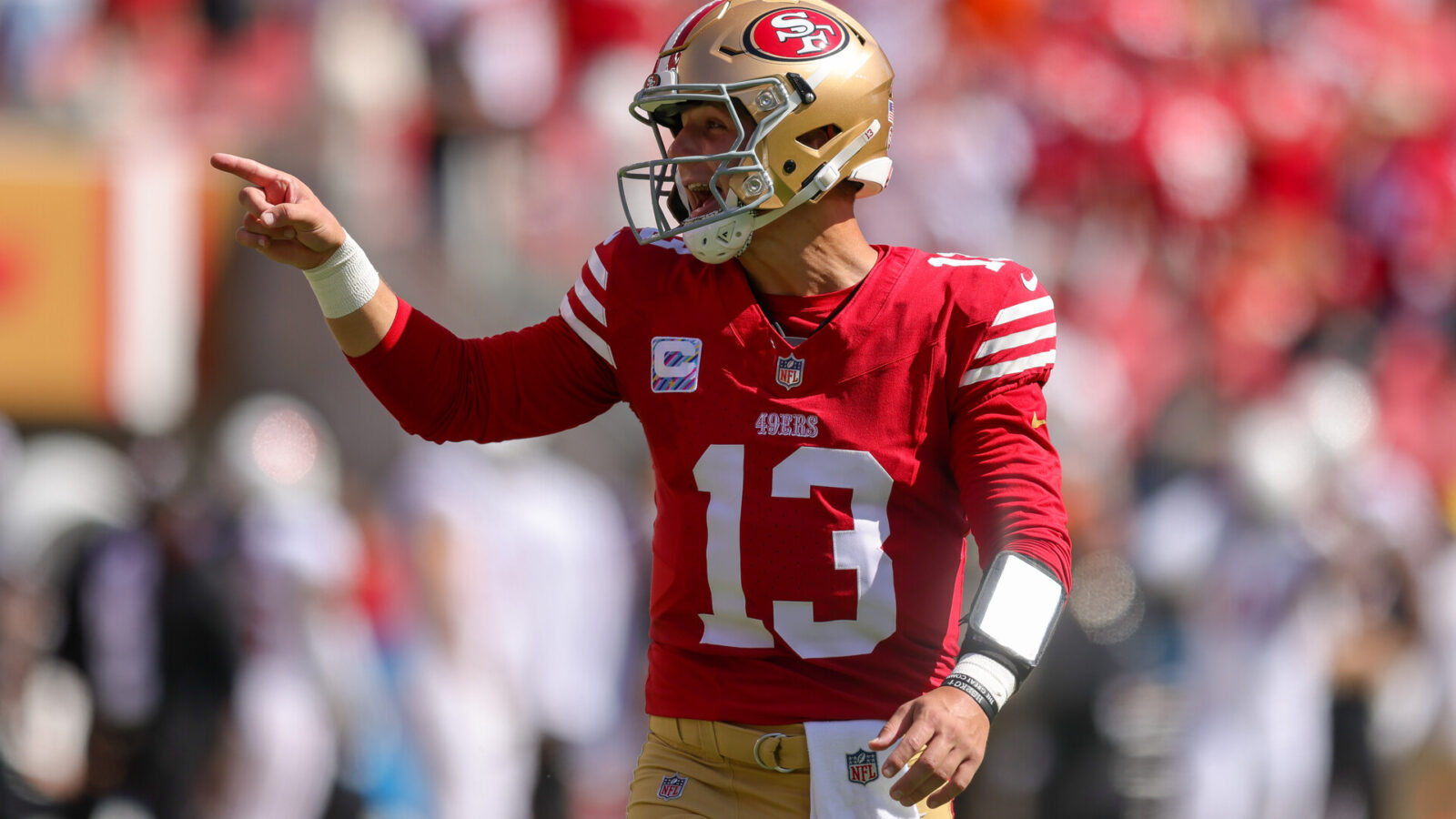 Oct 1, 2023; Santa Clara, California, USA; San Francisco 49ers quarterback Brock Purdy (13) celebrates after a touchdown during the second quarter against the Arizona Cardinals at Levi's Stadium.
