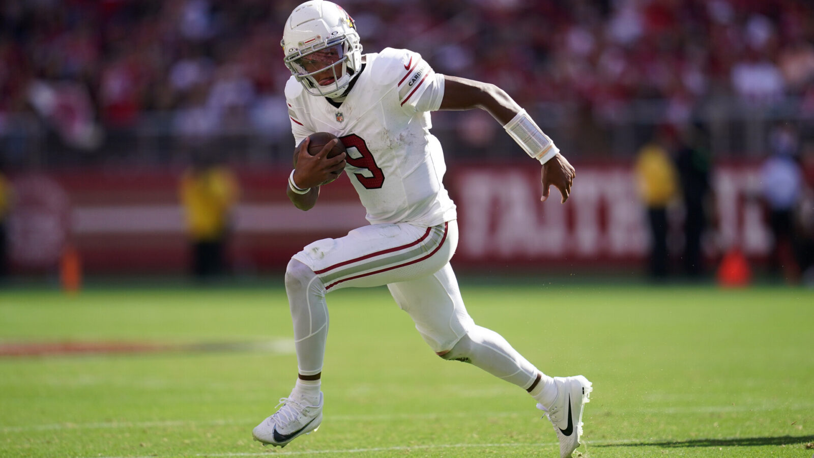 Oct 1, 2023; Santa Clara, California, USA; Arizona Cardinals quarterback Joshua Dobbs (9) runs the ball against the San Francisco 49ers in the third quarter at Levi's Stadium.