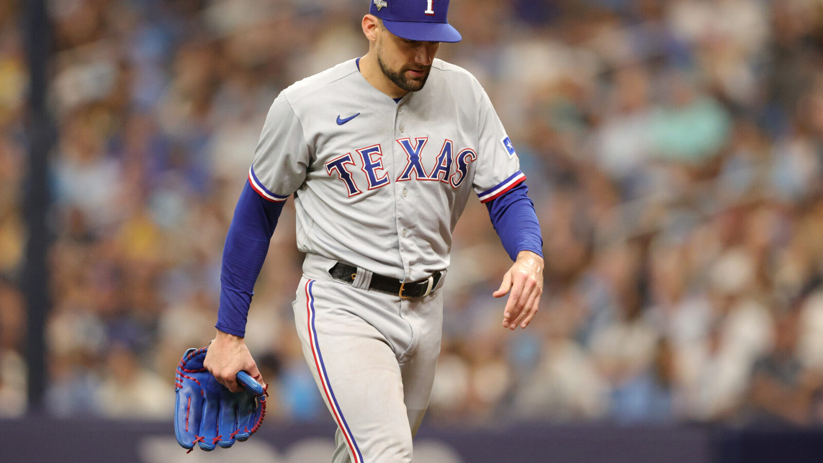 Oct 4, 2023; St. Petersburg, Florida, USA; Texas Rangers starting pitcher Nathan Eovaldi (17) leaves the mound after the fifth inning against the Tampa Bay Rays during game two of the Wildcard series for the 2023 MLB playoffs at Tropicana Field.
