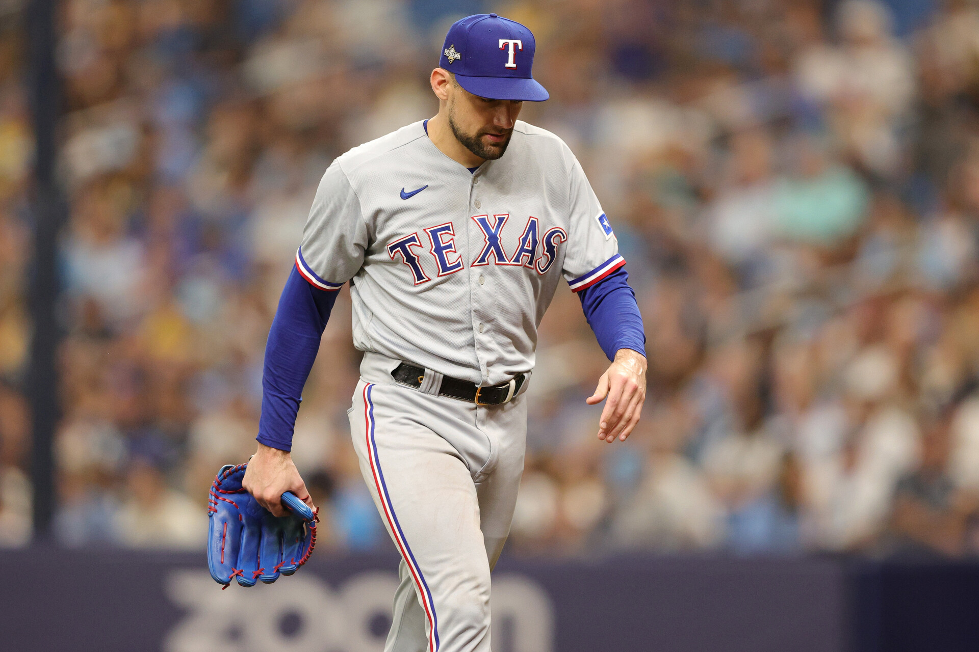 Oct 4, 2023; St. Petersburg, Florida, USA; Texas Rangers starting pitcher Nathan Eovaldi (17) leaves the mound after the fifth inning against the Tampa Bay Rays during game two of the Wildcard series for the 2023 MLB playoffs at Tropicana Field.