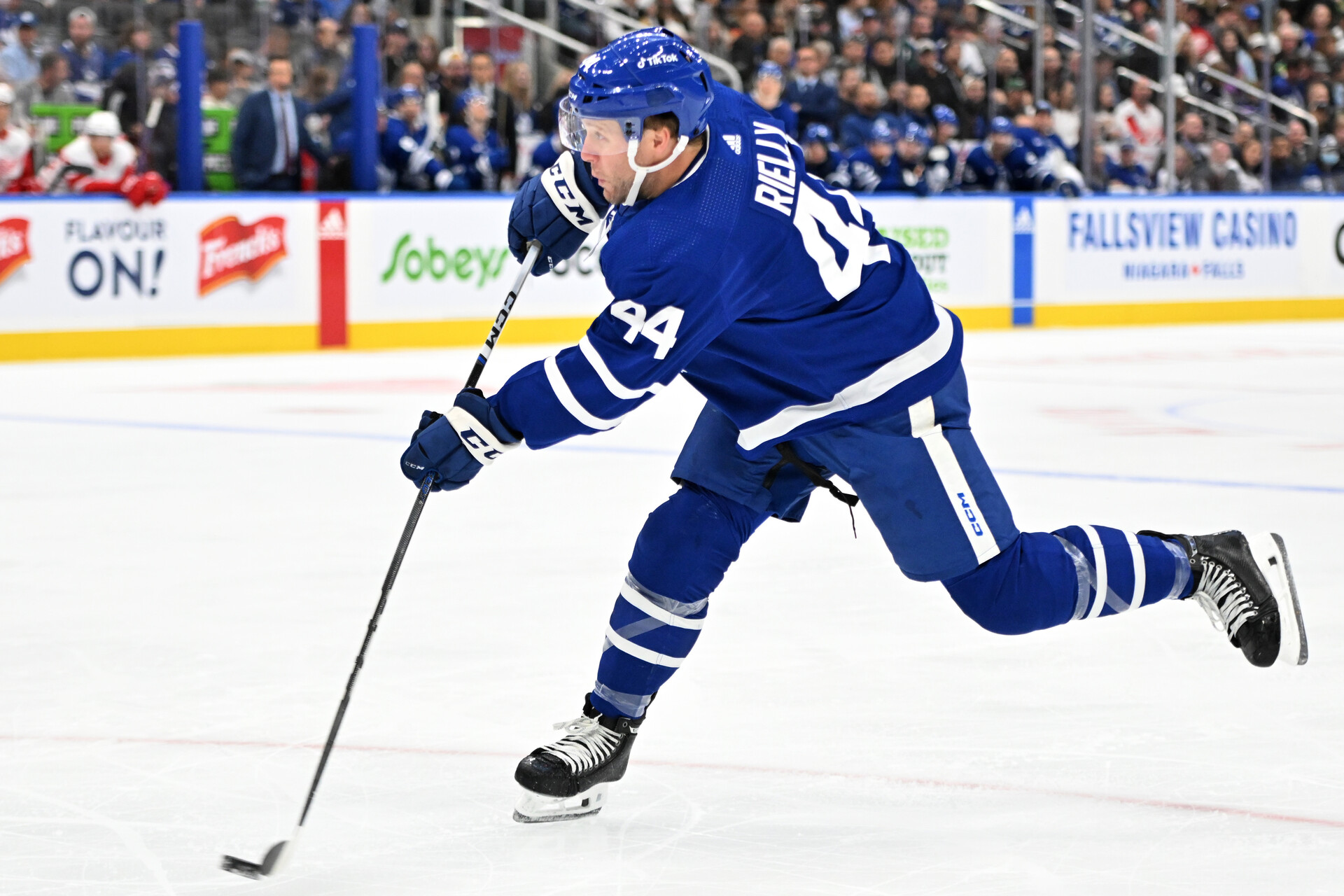 Oct 5, 2023; Toronto, Ontario, CAN; Toronto Maple Leafs defenseman Morgan Rielly (44) shoots the puck against the Detroit Red Wings in the first period at Scotiabank Arena.
