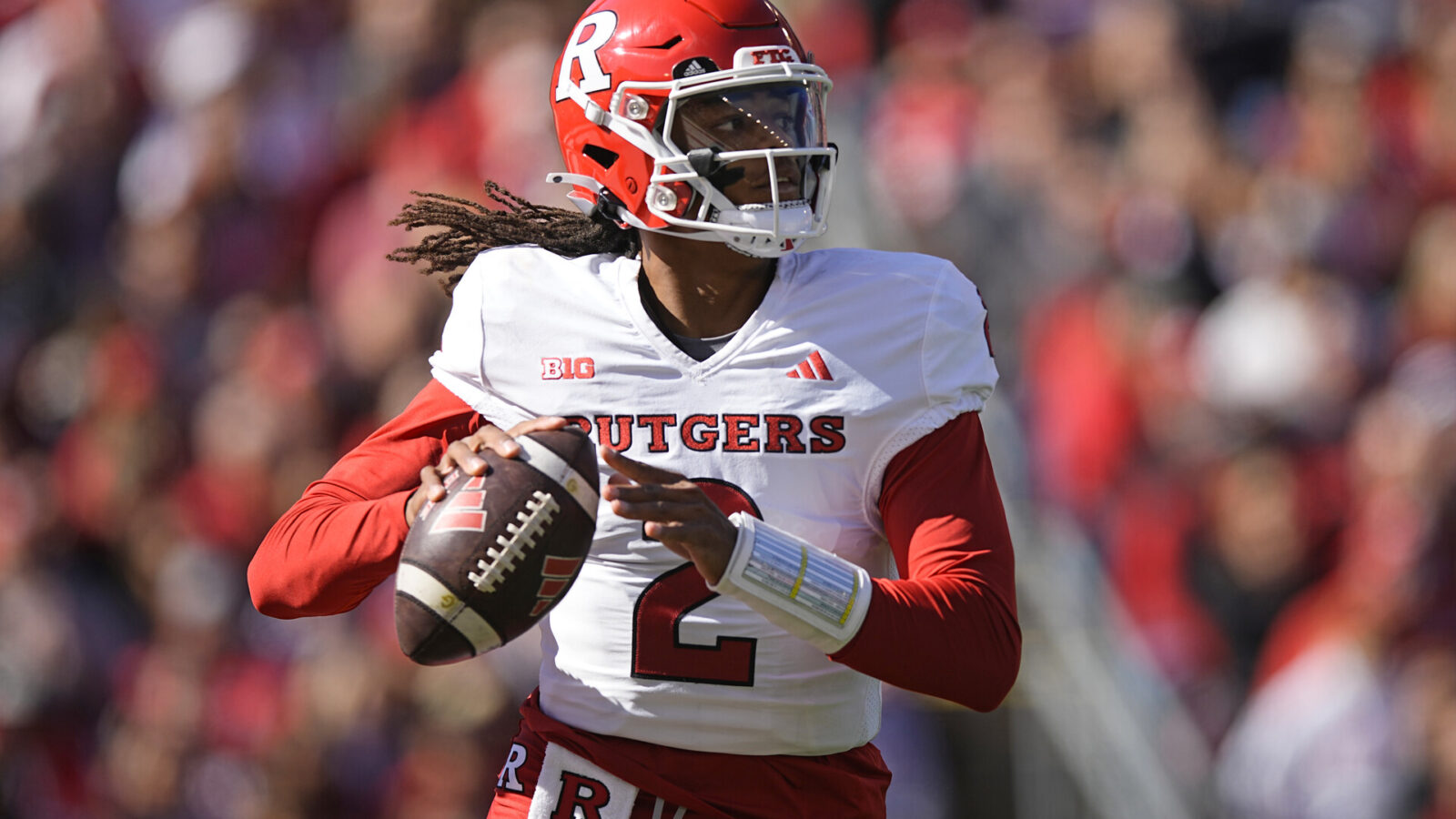 Oct 7, 2023; Madison, Wisconsin, USA; Rutgers Scarlet Knights quarterback Gavin Wimsatt (2) looks to throw a pass during the second quarter against the Wisconsin Badgers at Camp Randall Stadium.