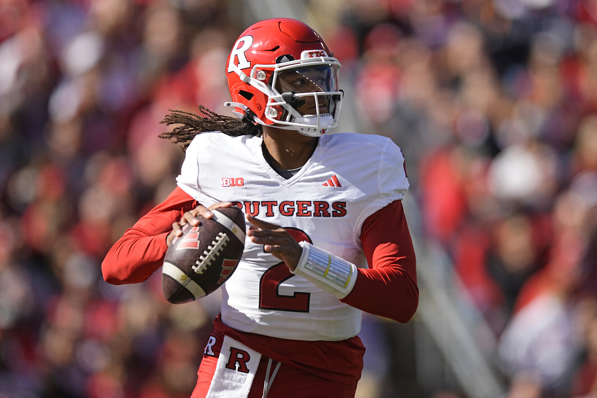 Oct 7, 2023; Madison, Wisconsin, USA; Rutgers Scarlet Knights quarterback Gavin Wimsatt (2) looks to throw a pass during the second quarter against the Wisconsin Badgers at Camp Randall Stadium.