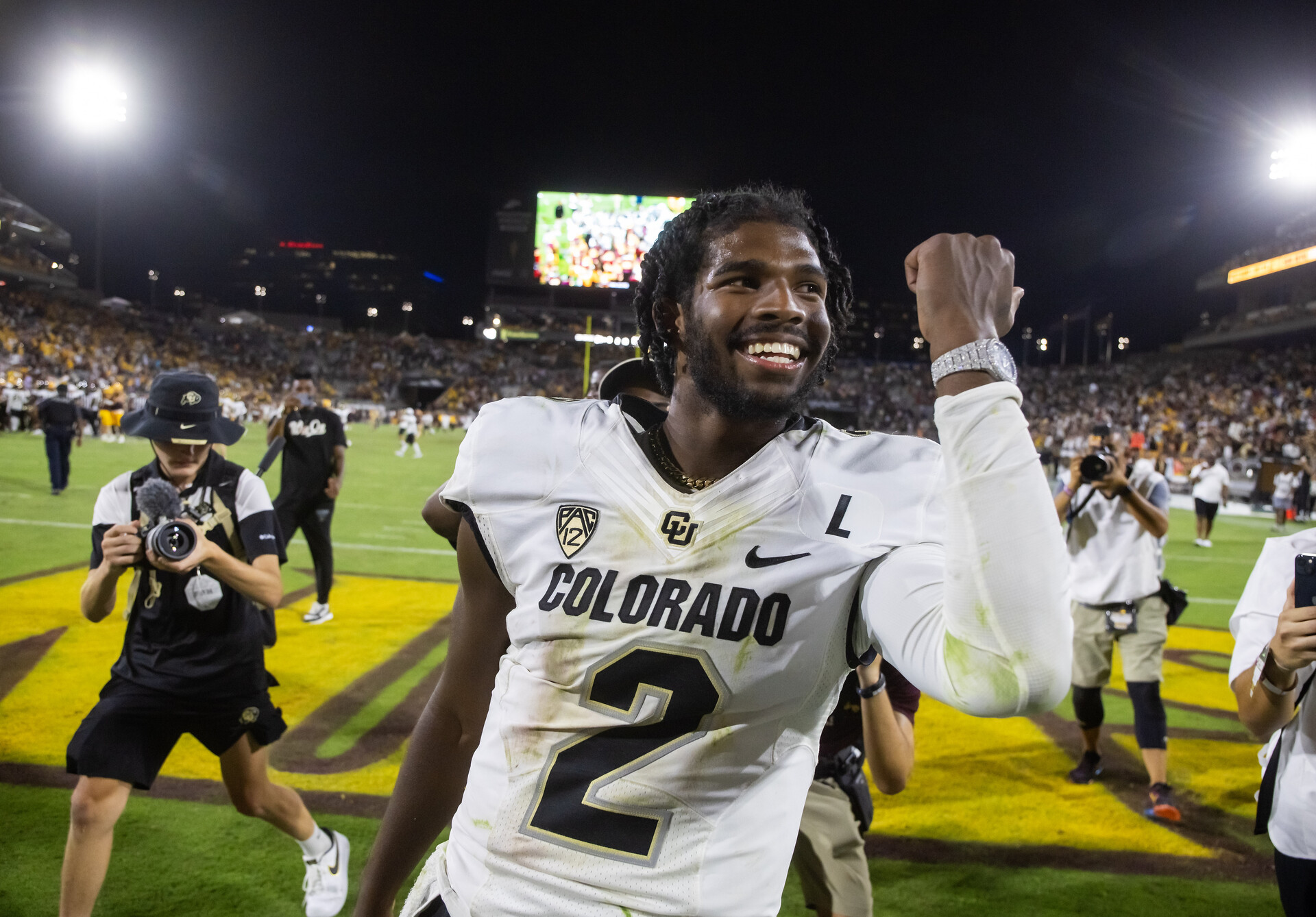 Colorado Buffaloes quarterback Shedeur Sanders (2) celebrates after defeating the Arizona State Sun Devils at Mountain America Stadium, Home of the ASU Sun Devils.