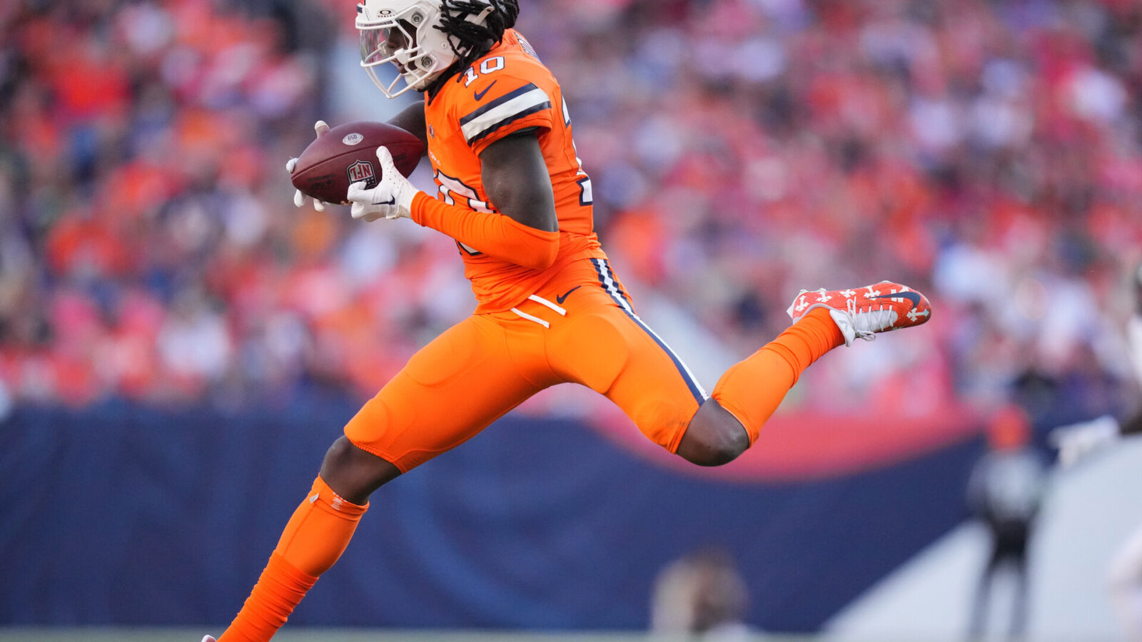 Oct 8, 2023; Denver, Colorado, USA; Denver Broncos wide receiver Jerry Jeudy (10) catches the ball in the second half against the New York Jets at Empower Field at Mile High.