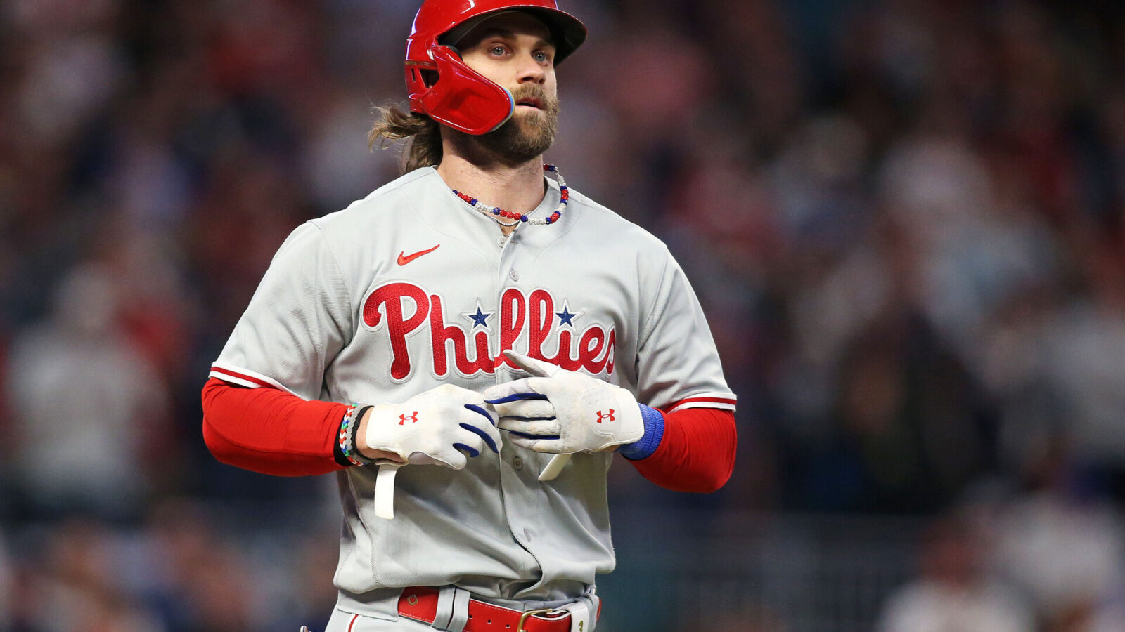 Oct 9, 2023; Cumberland, Georgia, USA; Philadelphia Phillies designated hitter Bryce Harper (3) walks during the ninth inning against the Atlanta Braves in game two of the NLDS for the 2023 MLB playoffs at Truist Park.