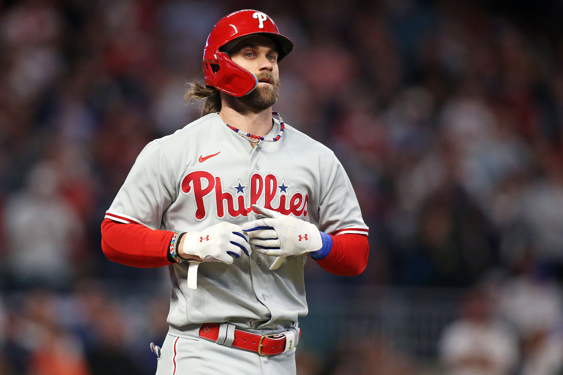 Oct 9, 2023; Cumberland, Georgia, USA; Philadelphia Phillies designated hitter Bryce Harper (3) walks during the ninth inning against the Atlanta Braves in game two of the NLDS for the 2023 MLB playoffs at Truist Park.