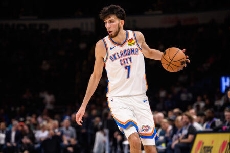 Oklahoma City Thunder forward Chet Holmgren (7) dribbles the ball during the game against the San Antonio Spurs at Paycom Center.
