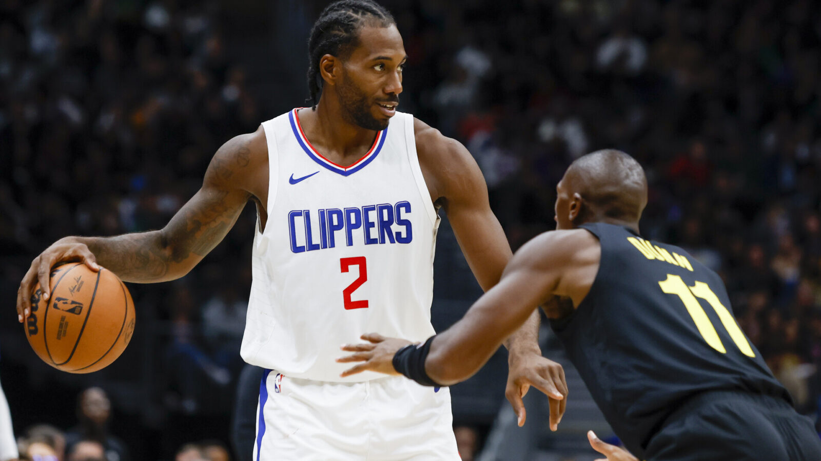 Oct 10, 2023; Seattle, Washington, USA; LA Clippers forward Kawhi Leonard (2) looks to pass against the Utah Jazz during the second quarter at Climate Pledge Arena.