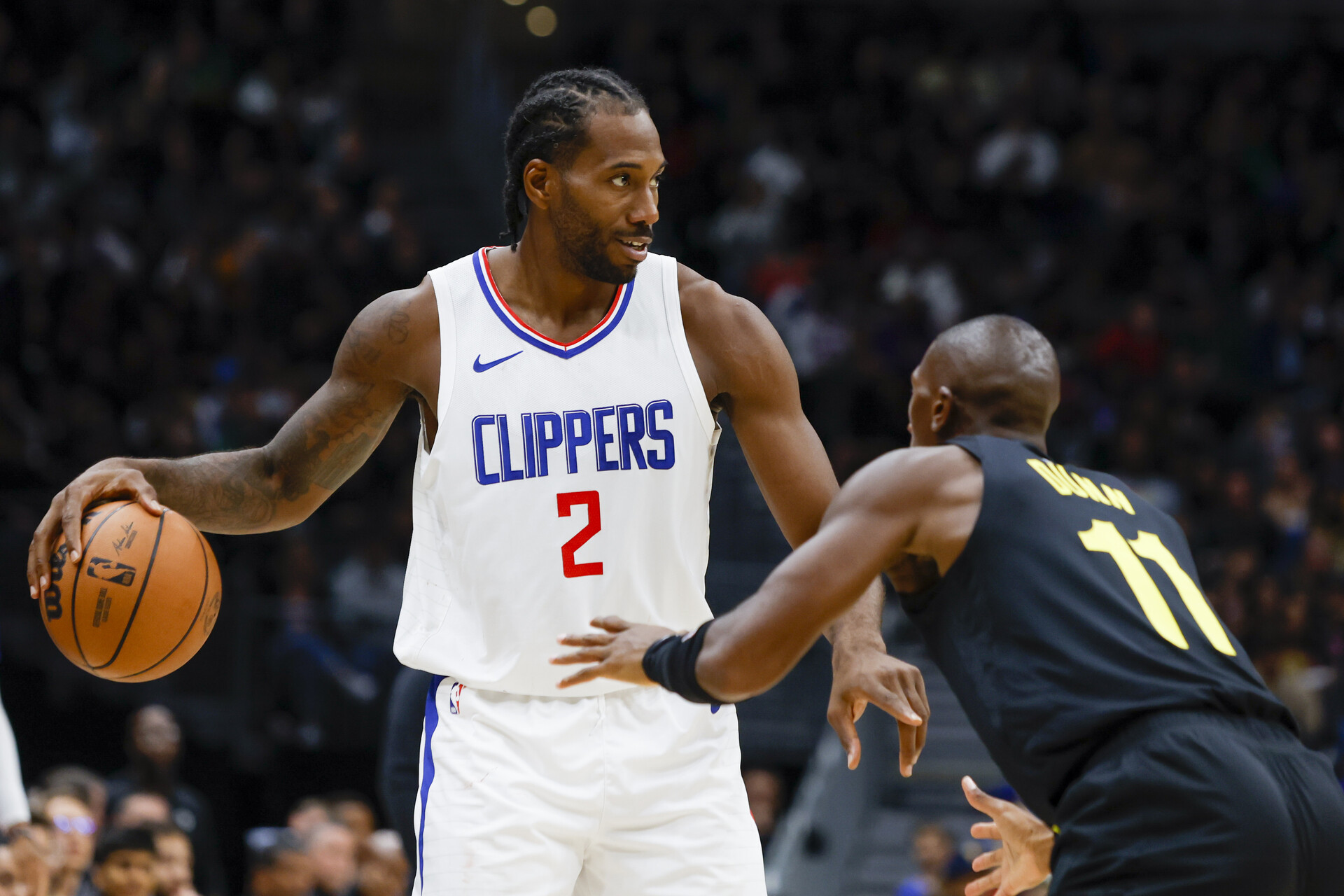 Oct 10, 2023; Seattle, Washington, USA; LA Clippers forward Kawhi Leonard (2) looks to pass against the Utah Jazz during the second quarter at Climate Pledge Arena.
