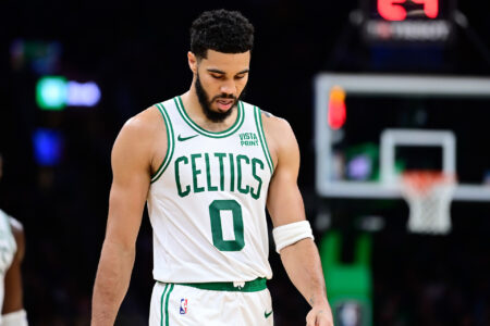 Oct 8, 2023; Boston, Massachusetts, USA; Boston Celtics forward Jayson Tatum (0) walks up the court during a break in a game against the Philadelphia 76ers during the second half at TD Garden.