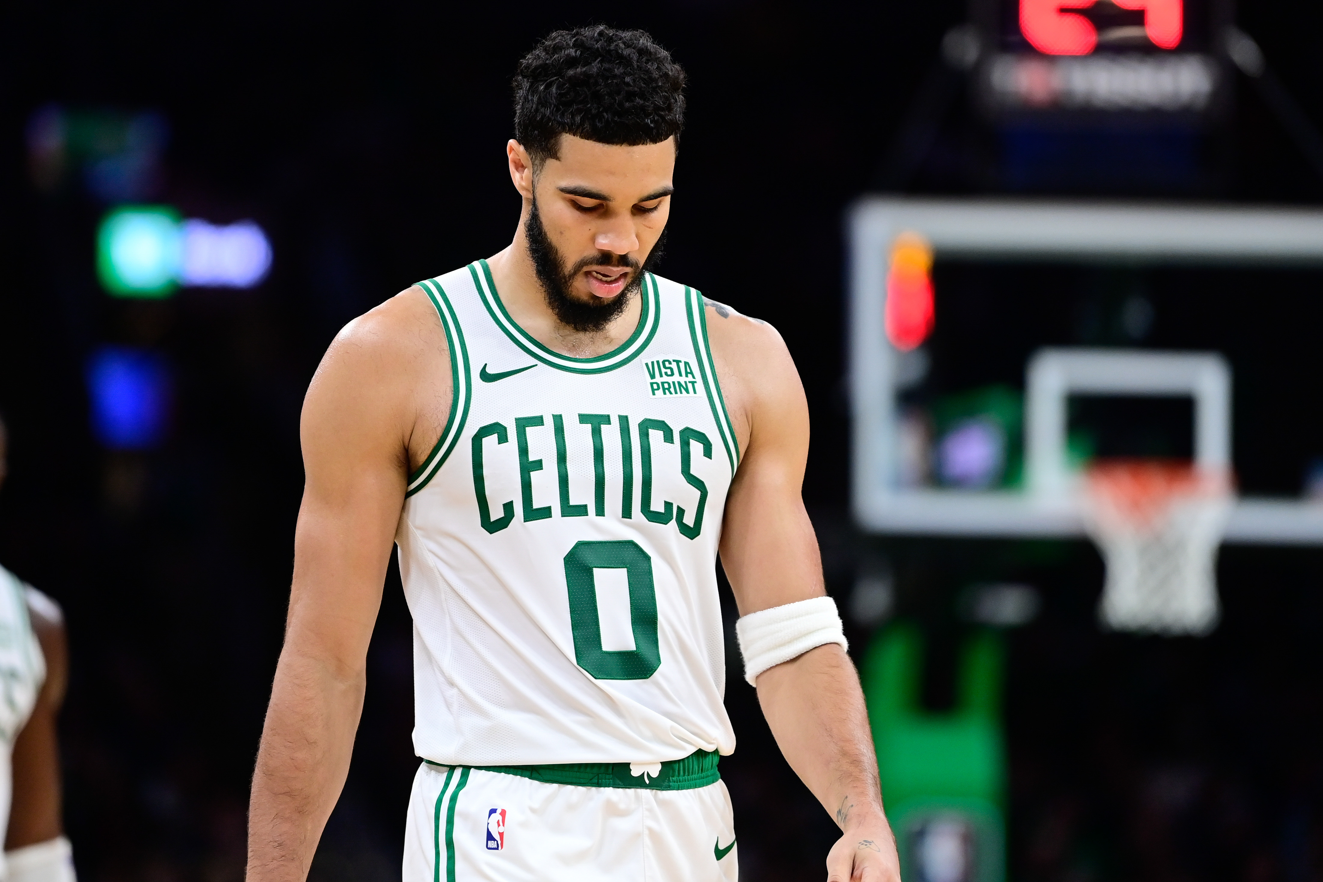 Oct 8, 2023; Boston, Massachusetts, USA; Boston Celtics forward Jayson Tatum (0) walks up the court during a break in a game against the Philadelphia 76ers during the second half at TD Garden.