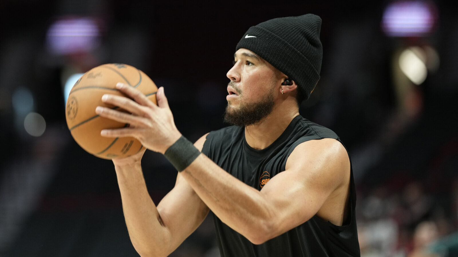 Oct 12, 2023; Portland, Oregon, USA; Phoenix Suns shooting guard Devin Booker (1) warms up prior to a game against the Portland Trail Blazers at Moda Center