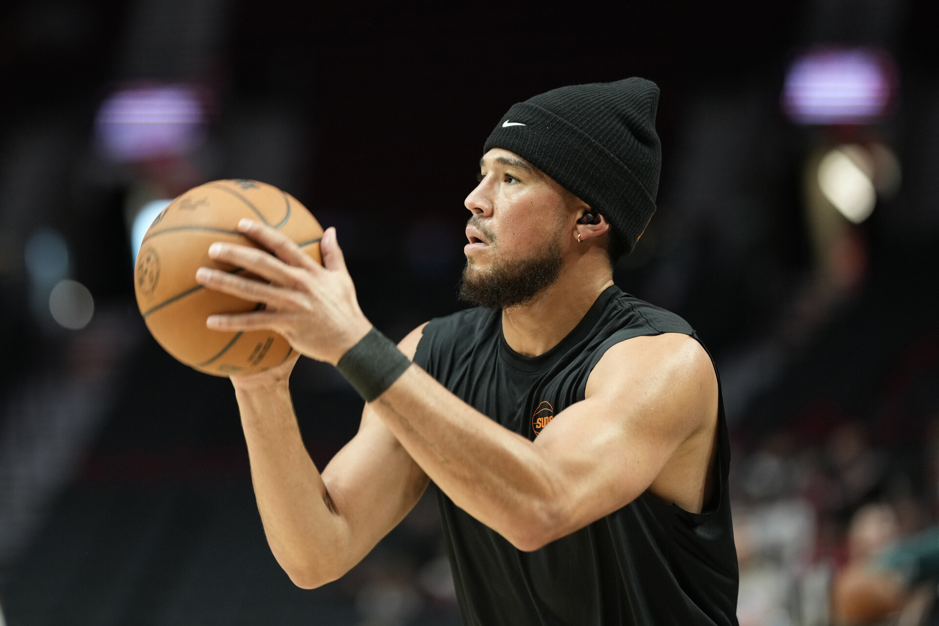 Oct 12, 2023; Portland, Oregon, USA; Phoenix Suns shooting guard Devin Booker (1) warms up prior to a game against the Portland Trail Blazers at Moda Center