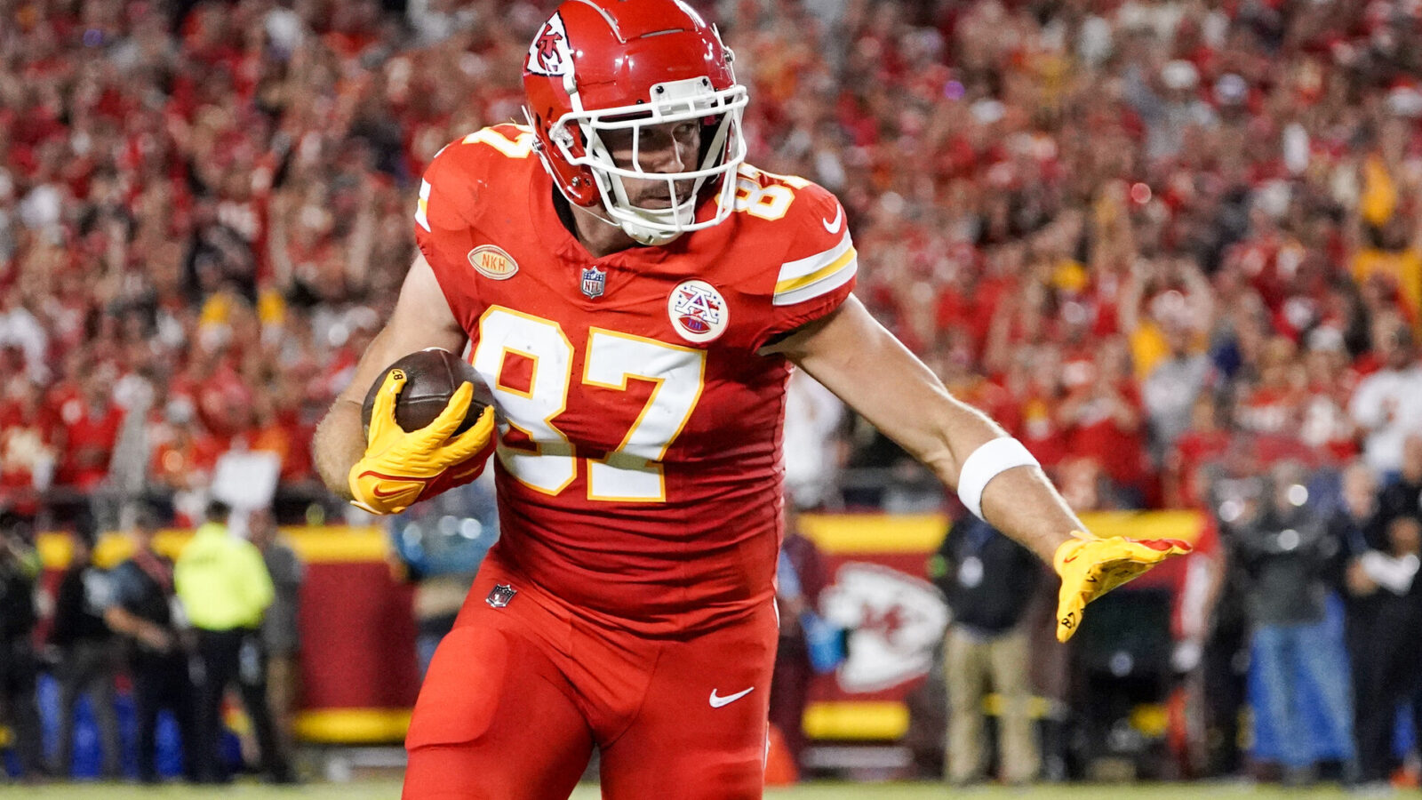 Oct 12, 2023; Kansas City, Missouri, USA; Kansas City Chiefs tight end Travis Kelce (87) runs the ball against the Denver Broncos during the first half at GEHA Field at Arrowhead Stadium.