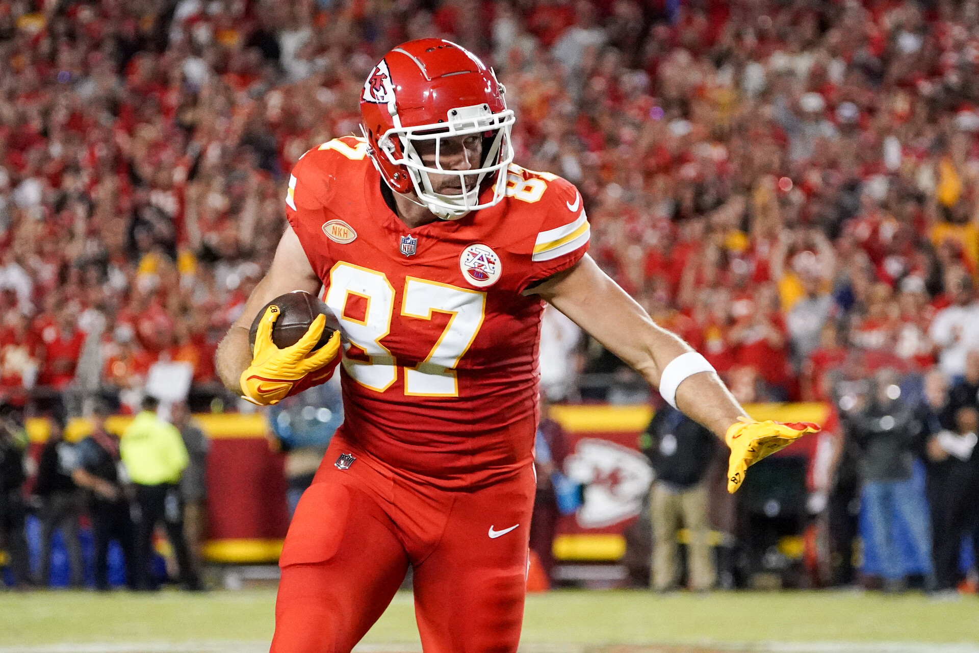 Oct 12, 2023; Kansas City, Missouri, USA; Kansas City Chiefs tight end Travis Kelce (87) runs the ball against the Denver Broncos during the first half at GEHA Field at Arrowhead Stadium.
