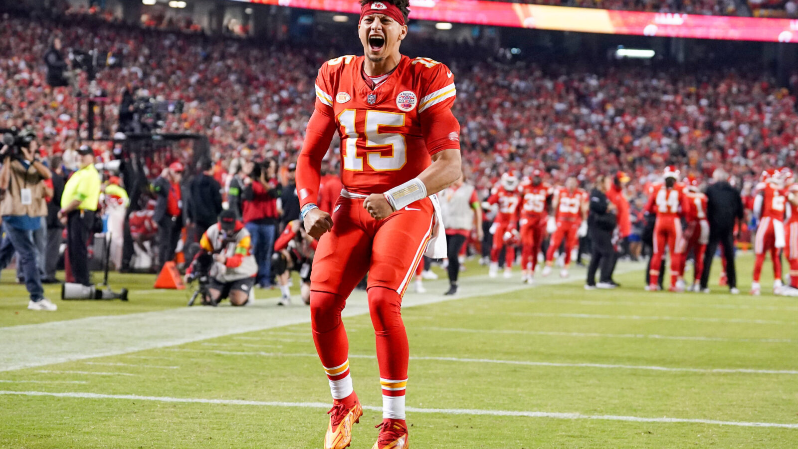 Oct 12, 2023; Kansas City, Missouri, USA; Kansas City Chiefs quarterback Patrick Mahomes (15) celebrates toward fans against the Denver Broncos prior to a game at GEHA Field at Arrowhead Stadium.