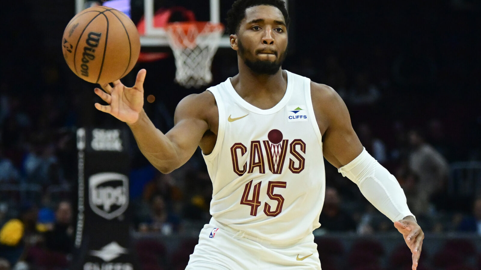 Oct 12, 2023; Cleveland, Ohio, USA; Cleveland Cavaliers guard Donovan Mitchell (45) passes during the second half against the Orlando Magic at Rocket Mortgage FieldHouse.