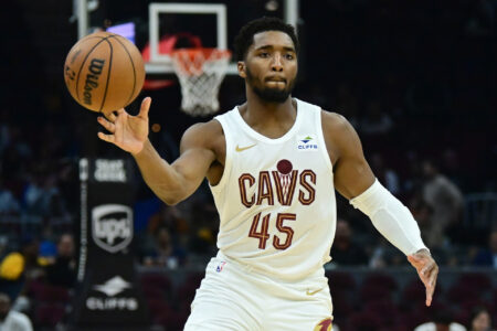 Oct 12, 2023; Cleveland, Ohio, USA; Cleveland Cavaliers guard Donovan Mitchell (45) passes during the second half against the Orlando Magic at Rocket Mortgage FieldHouse.