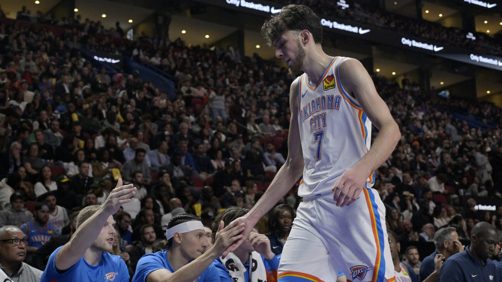 Oct 12, 2023; Montreal, Quebec, CAN; Oklahoma City Thunder center Chet Holmgren (7) comes back to the bench during the fourth quarter against the Detroit Pistons at the Bell Centre.