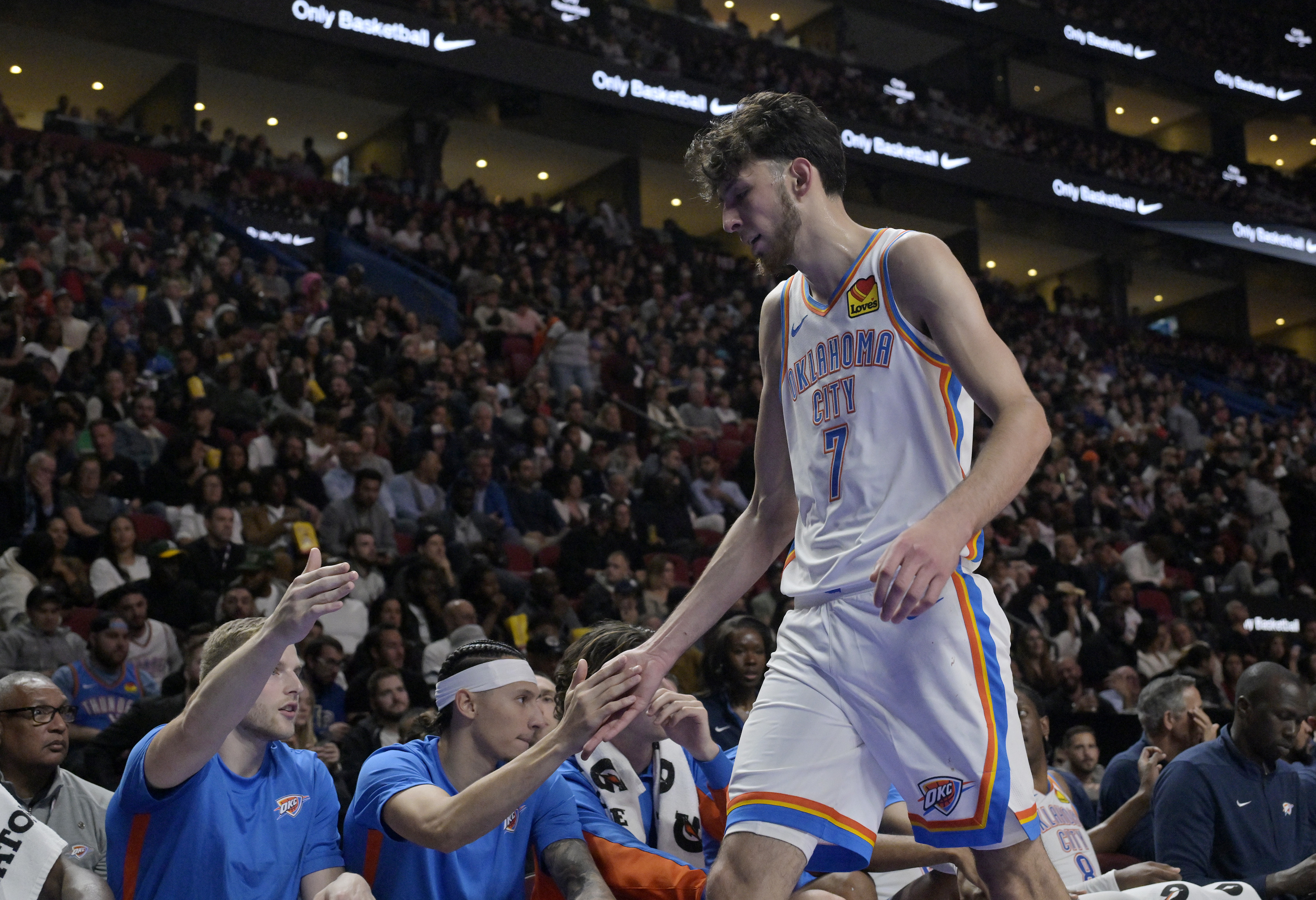 Oct 12, 2023; Montreal, Quebec, CAN; Oklahoma City Thunder center Chet Holmgren (7) comes back to the bench during the fourth quarter against the Detroit Pistons at the Bell Centre.