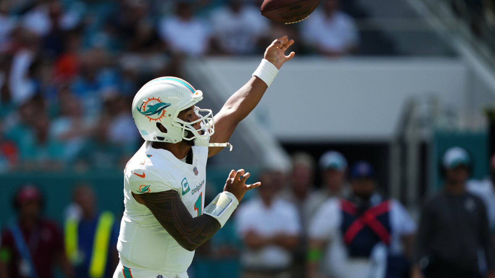 Oct 15, 2023; Miami Gardens, Florida, USA; Miami Dolphins quarterback Tua Tagovailoa (1) attempts a pass against the Carolina Panthers during the first half at Hard Rock Stadium.