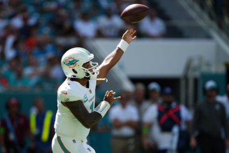Oct 15, 2023; Miami Gardens, Florida, USA; Miami Dolphins quarterback Tua Tagovailoa (1) attempts a pass against the Carolina Panthers during the first half at Hard Rock Stadium.