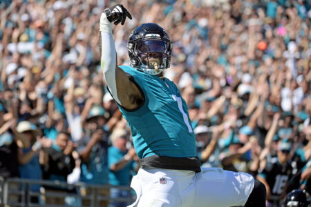 Oct 15, 2023; Jacksonville, Florida, USA; Jacksonville Jaguars running back Travis Etienne (1) celebrates after a touchdown run against the Indianapolis Colts in the first half at EverBank Stadium.