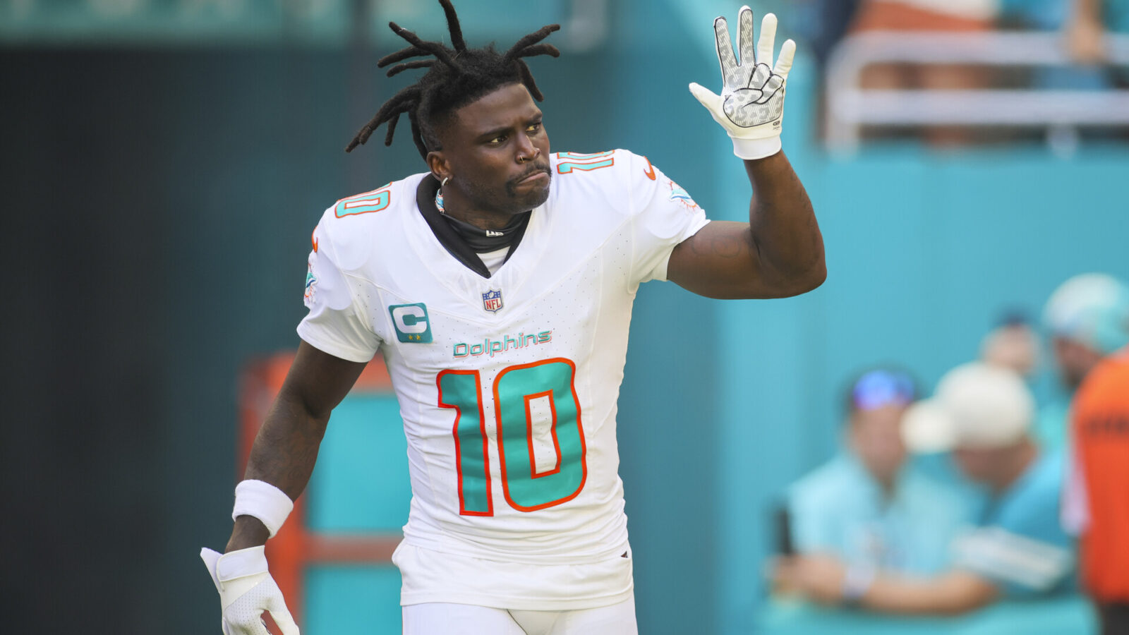 Oct 15, 2023; Miami Gardens, Florida, USA; Miami Dolphins wide receiver Tyreek Hill (10) reacts while taking on the field prior to the game against the Carolina Panthers at Hard Rock Stadium.