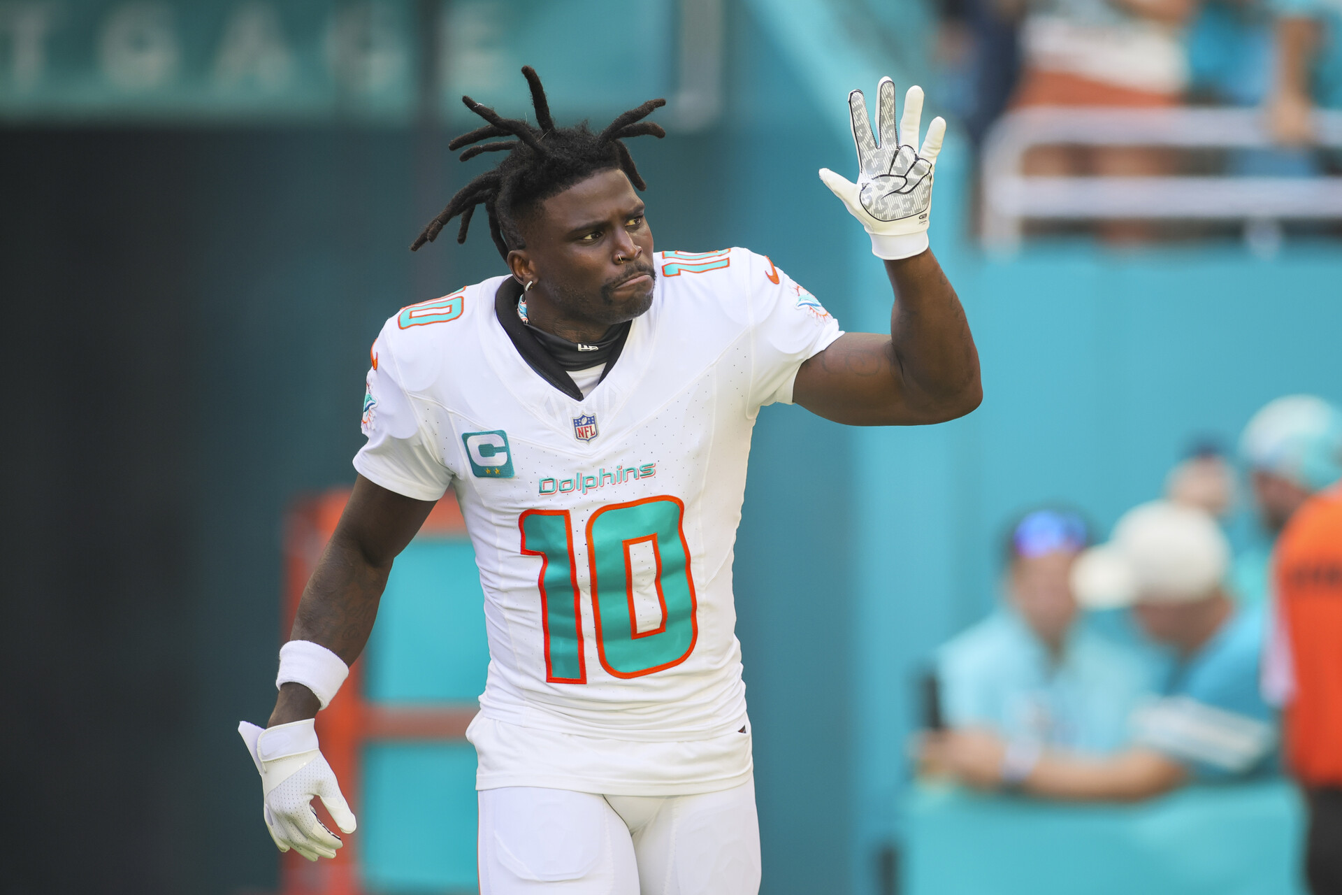 Oct 15, 2023; Miami Gardens, Florida, USA; Miami Dolphins wide receiver Tyreek Hill (10) reacts while taking on the field prior to the game against the Carolina Panthers at Hard Rock Stadium.