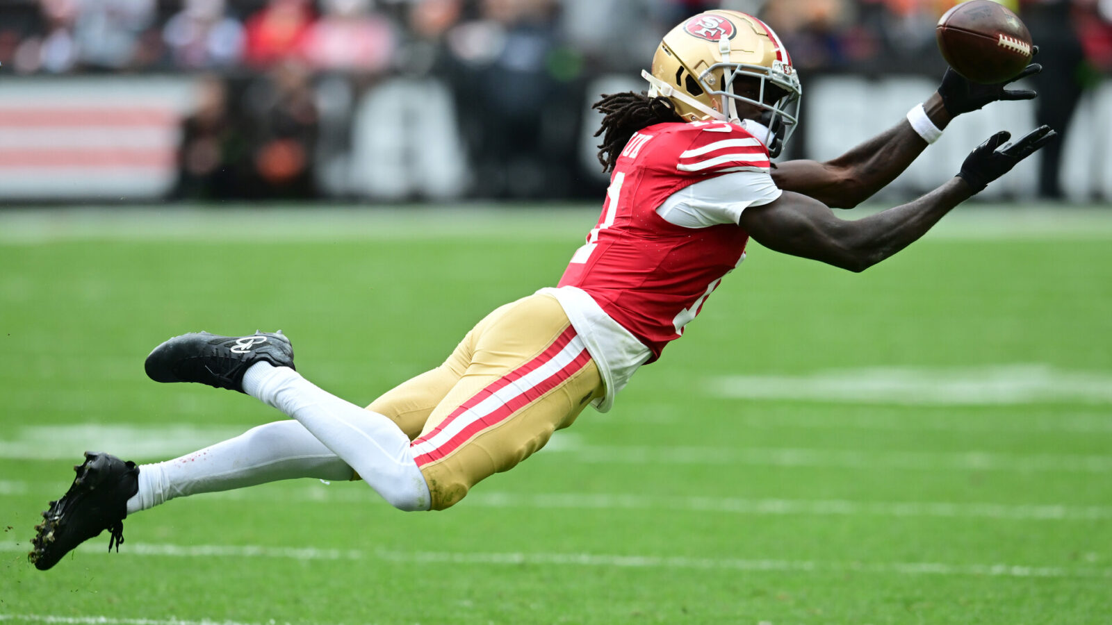 Oct 15, 2023; Cleveland, Ohio, USA; San Francisco 49ers wide receiver Brandon Aiyuk (11) just misses a catch during the second half against the Cleveland Browns at Cleveland Browns Stadium.