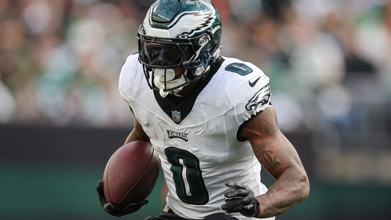 Philadelphia Eagles running back D'Andre Swift (0) carries the ball during the first half against the New York Jets at MetLife Stadium.