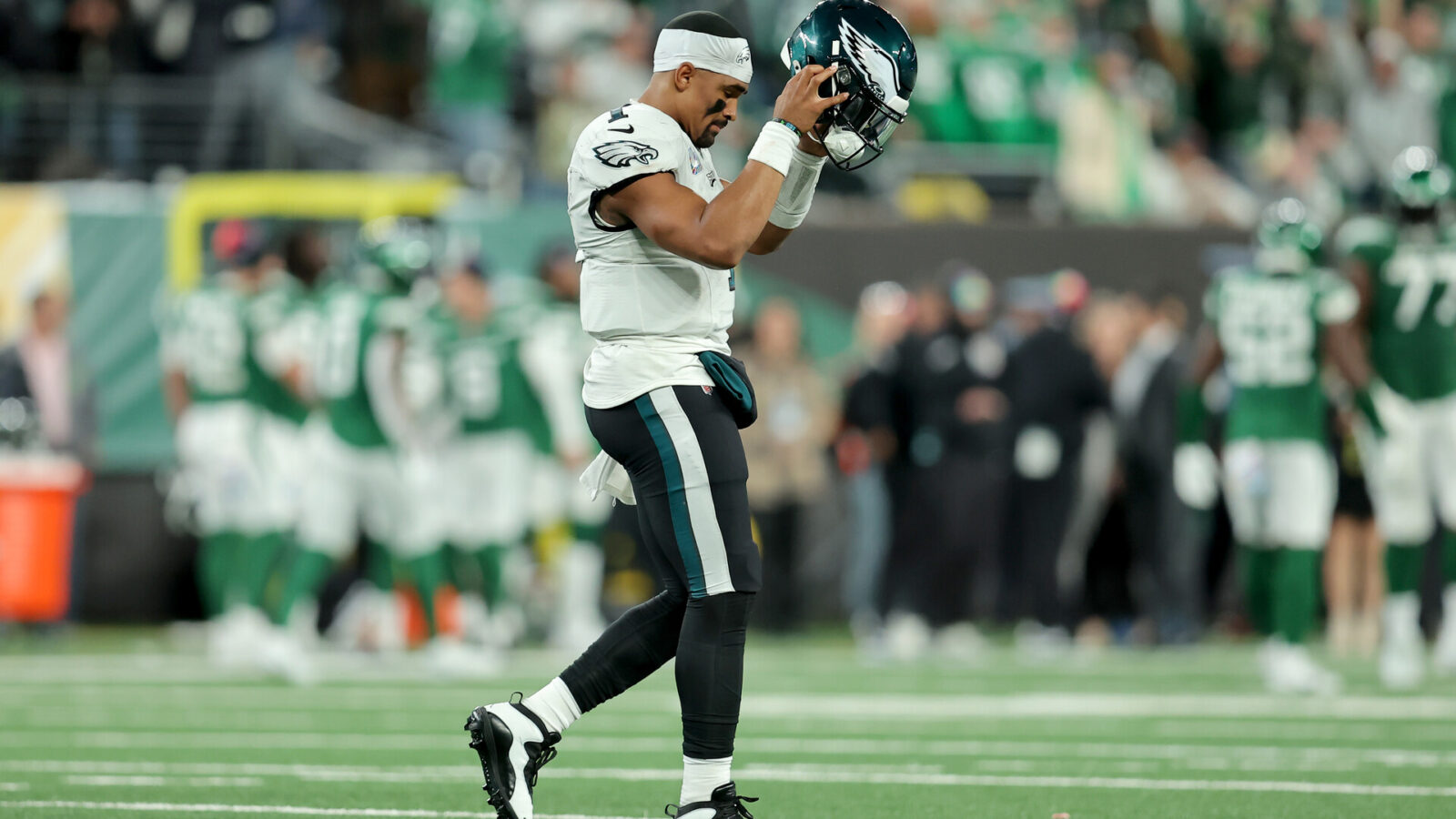 Oct 15, 2023; East Rutherford, New Jersey, USA; Philadelphia Eagles quarterback Jalen Hurts (1) reacts as he walks off the field during the fourth quarter against the New York Jets at MetLife Stadium.