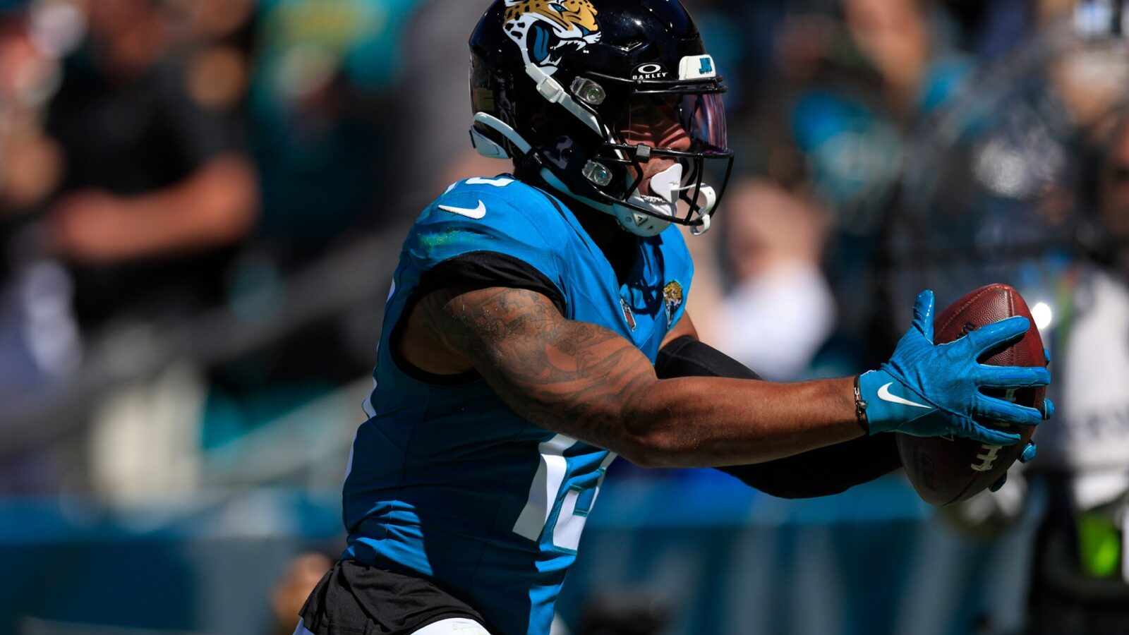Jacksonville Jaguars wide receiver Christian Kirk (13) scores a touchdown during the second quarter of an NFL football matchup Sunday, Oct. 15, 2023 at EverBank Stadium in Jacksonville, Fla. The Jacksonville Jaguars defeated the Indianapolis Colts 37-20.