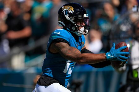 Jacksonville Jaguars wide receiver Christian Kirk (13) scores a touchdown during the second quarter of an NFL football matchup Sunday, Oct. 15, 2023 at EverBank Stadium in Jacksonville, Fla. The Jacksonville Jaguars defeated the Indianapolis Colts 37-20.