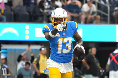 Oct 16, 2023; Inglewood, California, USA; Los Angeles Chargers wide receiver Keenan Allen (13) celebrates after scoring on a 1-yard touchdown reception against the Dallas Cowboys in the first half at SoFi Stadium.