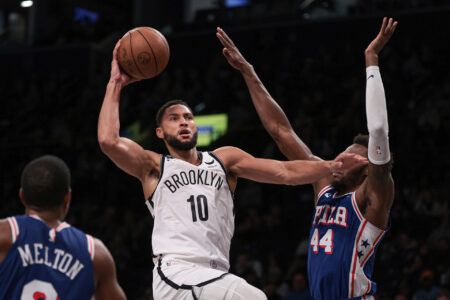 Oct 16, 2023; Brooklyn, New York, USA; Brooklyn Nets guard Ben Simmons (10) drives to the basket as Philadelphia 76ers forward Paul Reed (44) defends during the second half at Barclays Center.