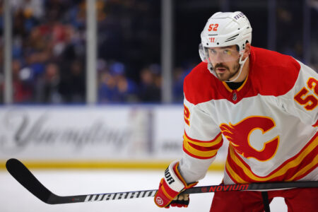 Calgary Flames defenseman MacKenzie Weegar (52) waits for the face-off during the third period against the Buffalo Sabres at KeyBank Center.