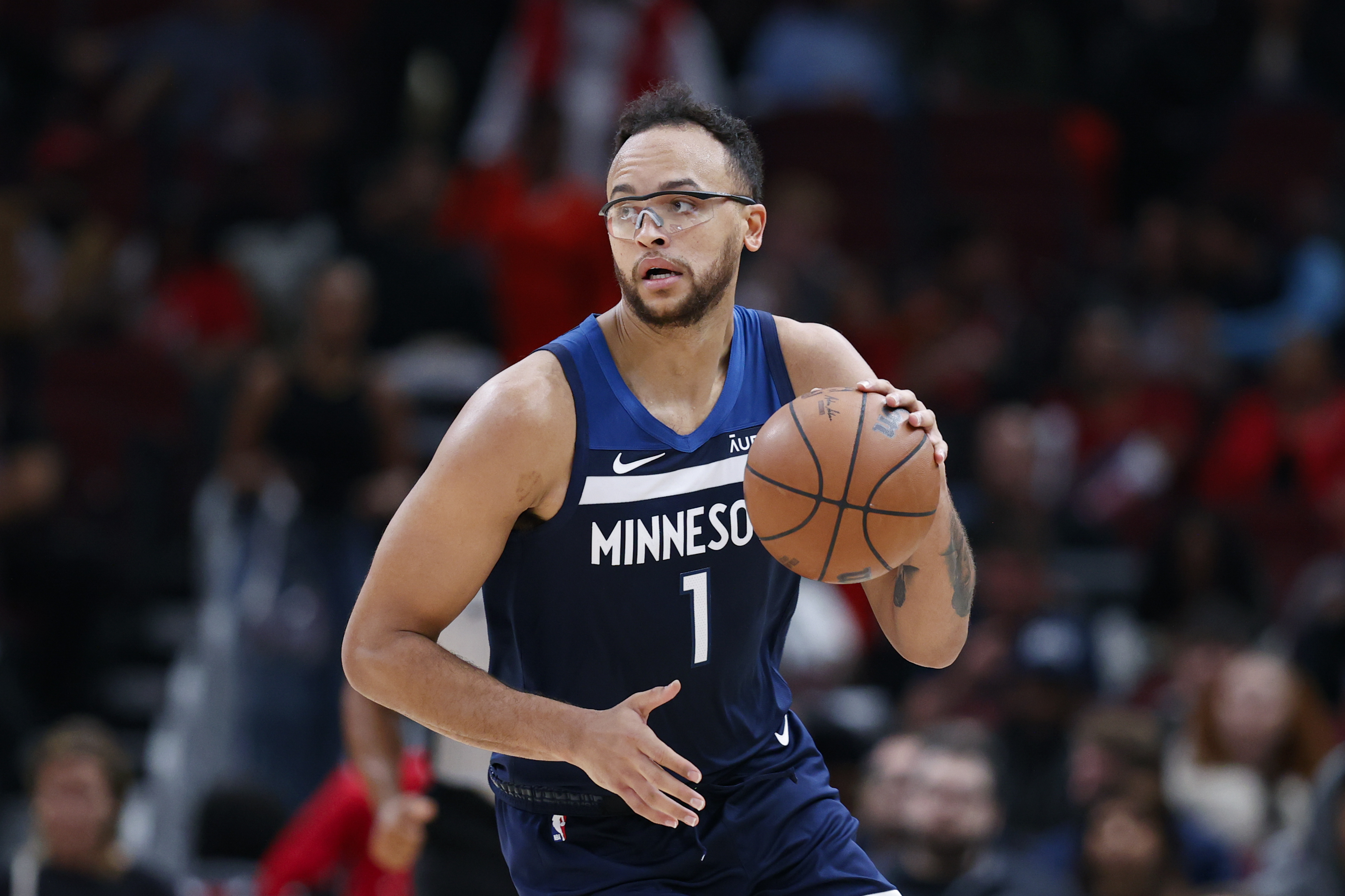 Oct 19, 2023; Chicago, Illinois, USA; Minnesota Timberwolves guard Anthony Edwards (1) brings the ball up court against the Chicago Bulls during the second half at United Center.