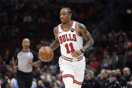 Oct 19, 2023; Chicago, Illinois, USA; Chicago Bulls forward DeMar DeRozan (11) brings the ball up court against the Minnesota Timberwolves during the first half at United Center.