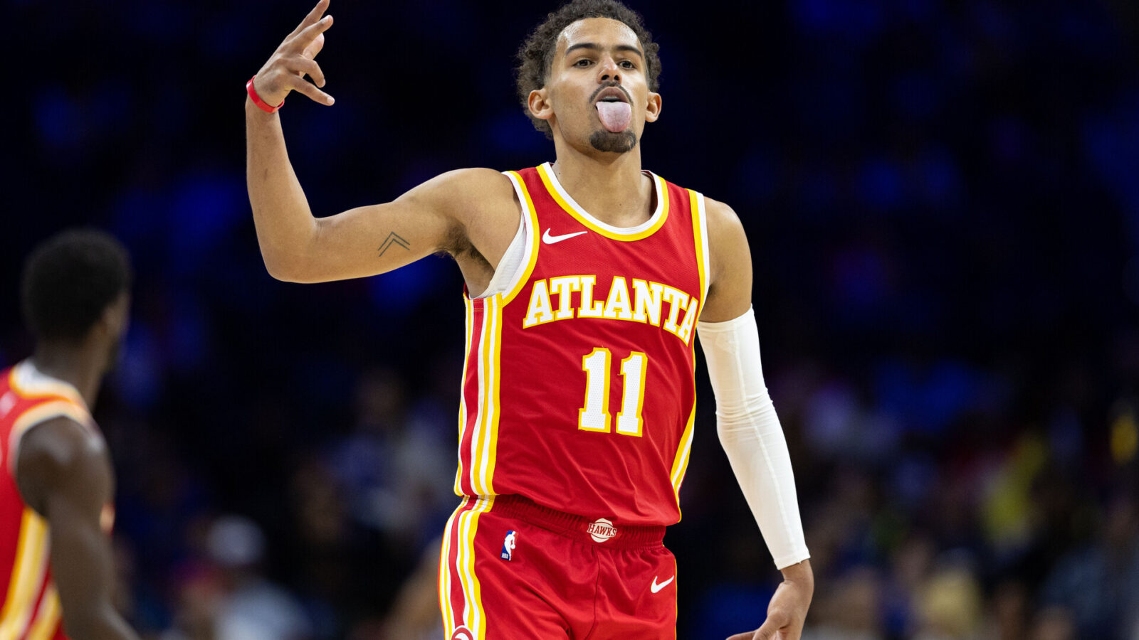 Oct 20, 2023; Philadelphia, Pennsylvania, USA; Atlanta Hawks guard Trae Young (11) reacts after a score against the Philadelphia 76ers during the third quarter at Wells Fargo Center.