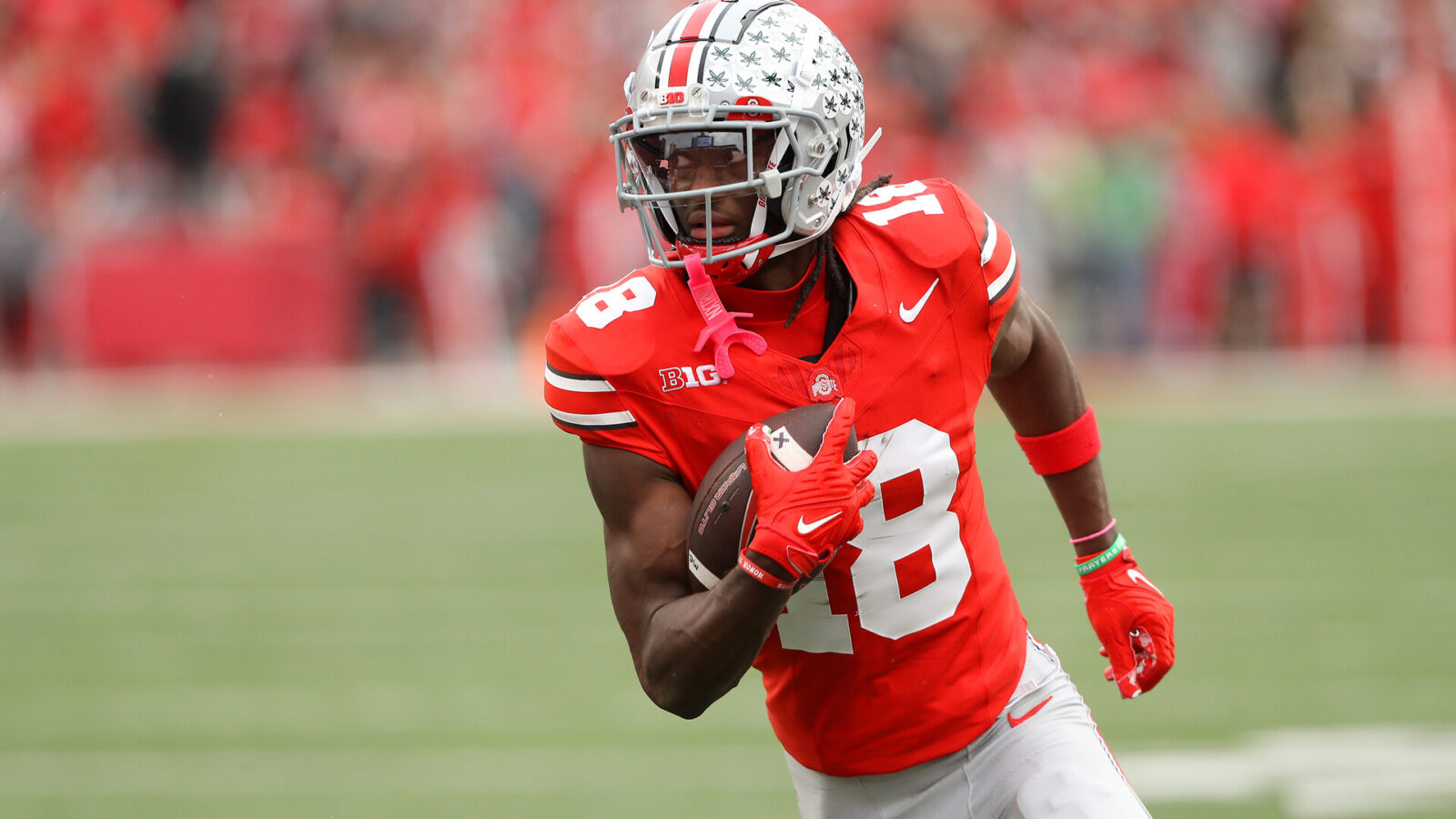 Ohio State Buckeyes wide receiver Marvin Harrison Jr. (18) scores a touchdown against the Penn State Nittany Lions during the fourth quarter at Ohio Stadium.